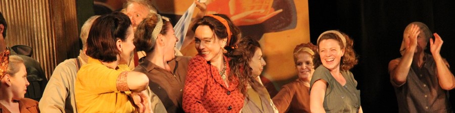 The cast of Carmen dancing for support